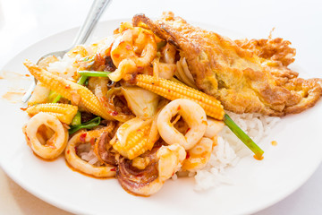 Stir-fried squid with chili paste with Thai omelette