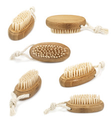 Universal brush made of natural bristles and wood isolated on wh
