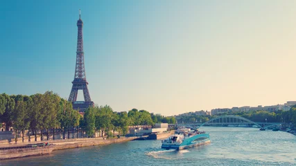 Fotobehang Paris skyline with Eiffel Tower and Seine River © Coy St. Clair