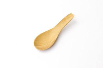 Wooden spoon isolated on white blackground