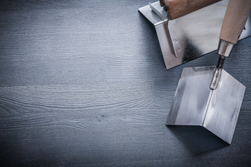 two angle formers on wooden board