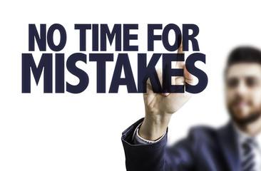 Business man pointing the text: No Time For Mistakes