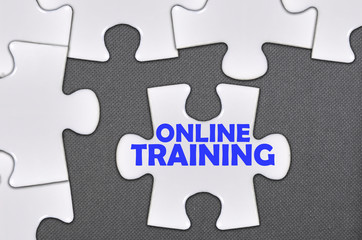 Fototapeta premium jigsaw puzzle written word online training
