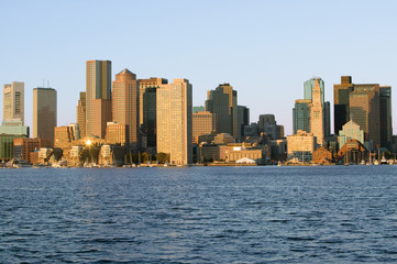 Boston Harbor and the Boston skyline at sunrise as seen from South Boston, Massachusetts, New England