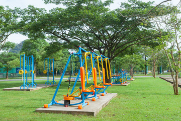 Obraz na płótnie Canvas Exercise equipment in public park in the morning at Thailand