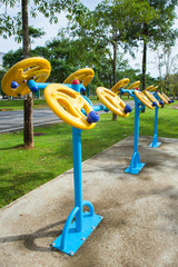 Exercise equipment in public park in the morning at Thailand