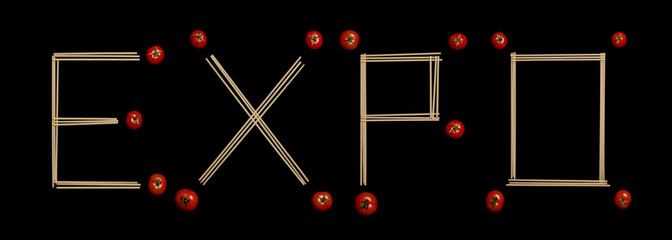 Expo written with spaghetti and tomatoes
