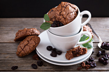 Chocolate cookies stacked in coffee cups