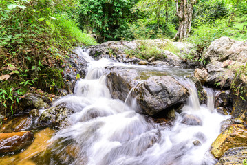 Naklejka na ściany i meble Khlong Lan waterfall in national park, Kamphaeng Phet Thailand.