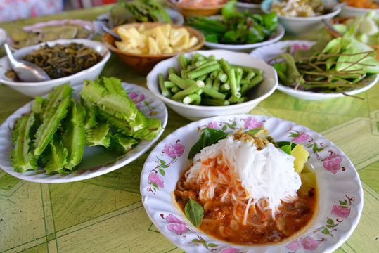 Thai Southern style rice noodle with curry, come along  with many kind of vegetables, Phang Nga, Thailand

