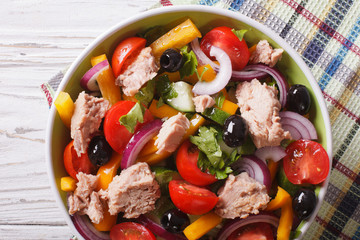 salad with tuna fish and vegetables close up horizontal top view
