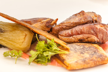  filets rôtis de pigeon à la feuille de brick