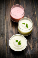 Homemade yogurt on wooden background
