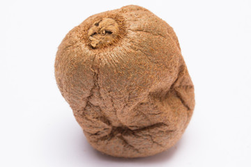 Spoiled kiwi on white background