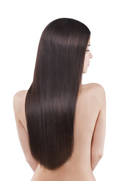 Back view of a woman with long straight black hair.