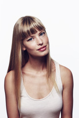 Fototapeta premium Beautiful young woman in studio portrait