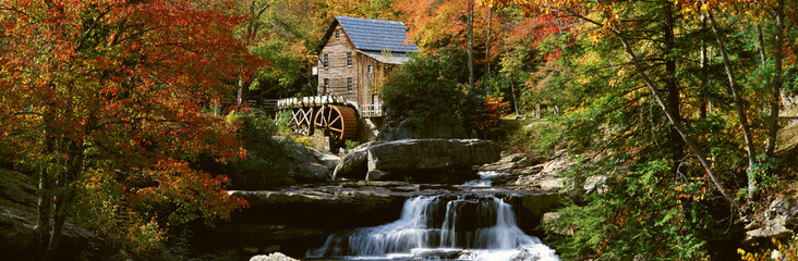Panoramic of Glade Creek Grist Mil and autumn reflections and waterfall in Babcock State Park, WV - obrazy, fototapety, plakaty
