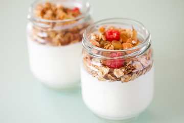 Fototapeta na wymiar delicious and healthy yogurt with granola
