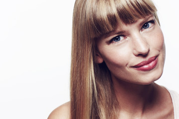 Fototapeta premium Close up of blue eyed beautiful woman