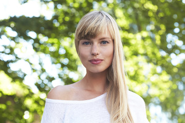 Fototapeta premium Beautiful young blond woman looking at camera