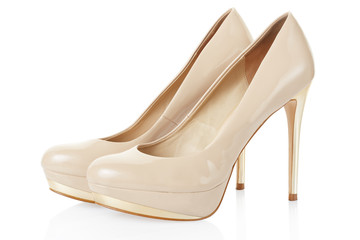 High heel beige shoes pair isolated on white, clipping path