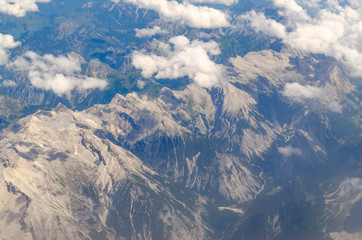 alps mountains top view from the plain