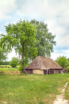 Ukrainian wooden barn Thatched locked uph