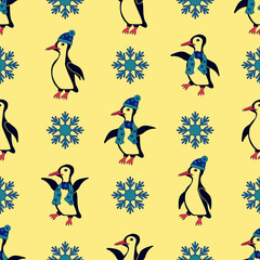 Penguins dressed in winter hats and scarves. Especially when the snowflakes falling