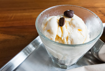 macro affogato on plate and wood table