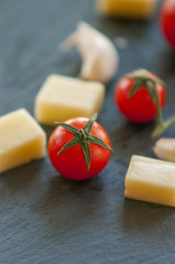 Italian cheese with tomato and garlic