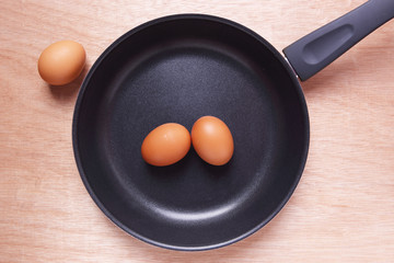 Hen Eggs on Wooden Table for Background Uses.