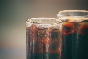 Glass of cola with ice cubes