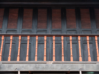 wood door and orange bars