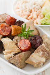 typical portuguese dish cozido a portuguesa and red wine
