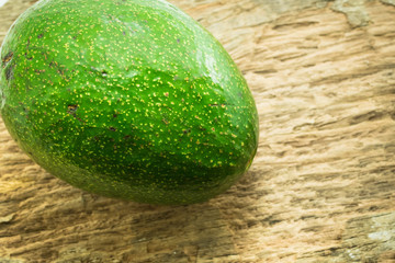 avocado on wood background