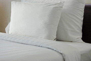 close-up white pillow on the bedroom