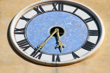 Fototapeta na wymiar Close-up clock on a church