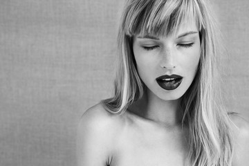 Passionate young woman in black and white