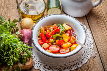 Ratatouille on a rustic table.