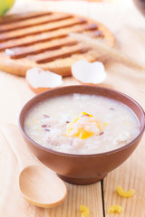Healthy rice soup, congee mixed with pork and eggs