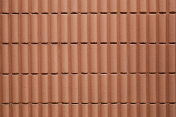 Motifs of brown cement wall background.
