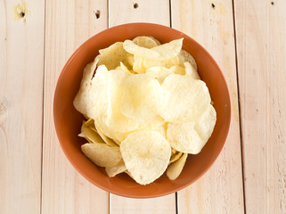 potato chips on wood background