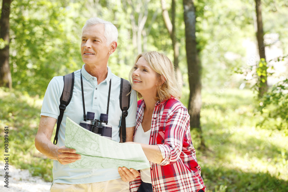 Wall mural hiking senior couple