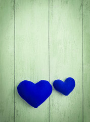 Abstract background of Blue heart on wood floor