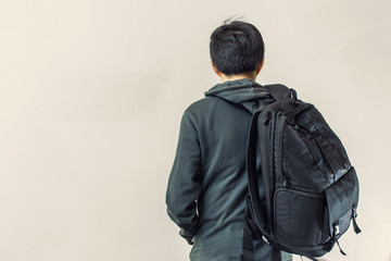 Man carrying a suitcase