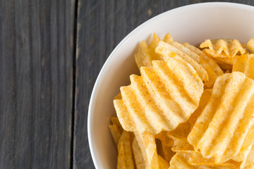 potato chips on wood background