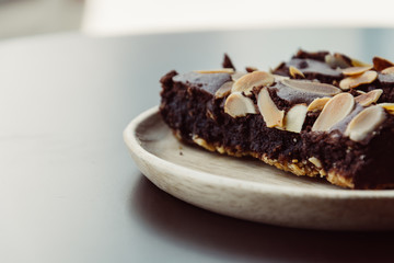 chocolate brownies on wood plate