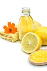 Spa and wellness setting with sea salt, oil essence, flowers