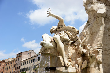 Rome, Italy - April 18, 2015: Tourists visit Piazza Navona with fountain in Rome, Italy. Rome is of the most visited city in Europe and world