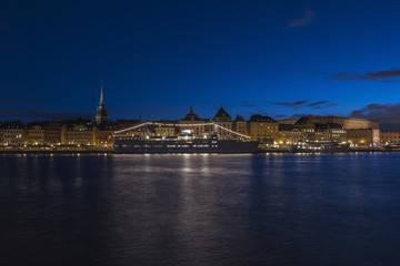 Fototapeta na wymiar Old Town (Gamla Stan) skyline architecture pier in Twilight time, Stockholm city, Sweden